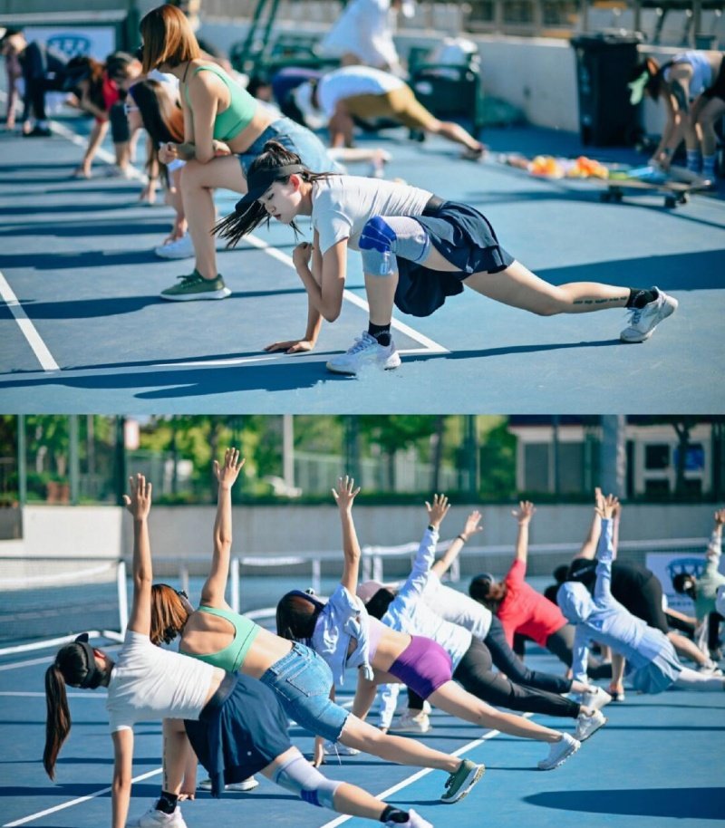 Group of people stretching on a sunny day at a sports court