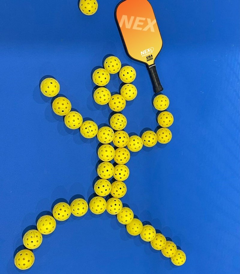 Creative pickleball figure made with balls and a NEX paddle, highlighting the brand