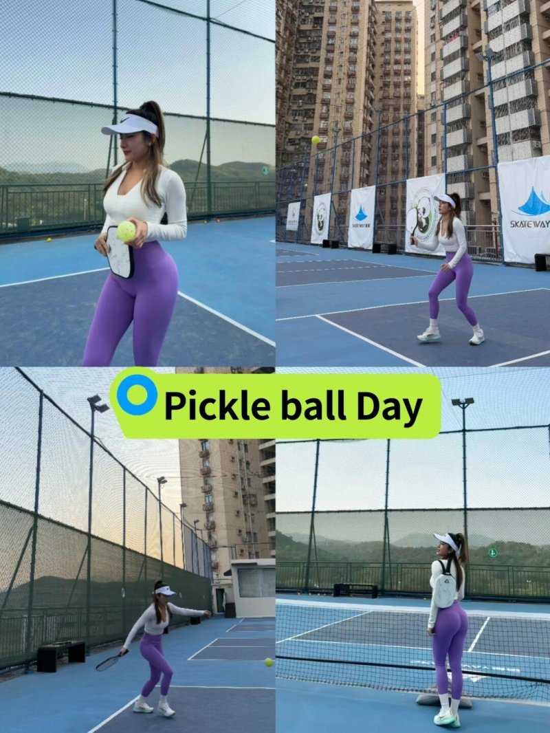 Pickleball Day Outdoor Match Woman playing pickleball on an outdoor court surrounded by tall buildings