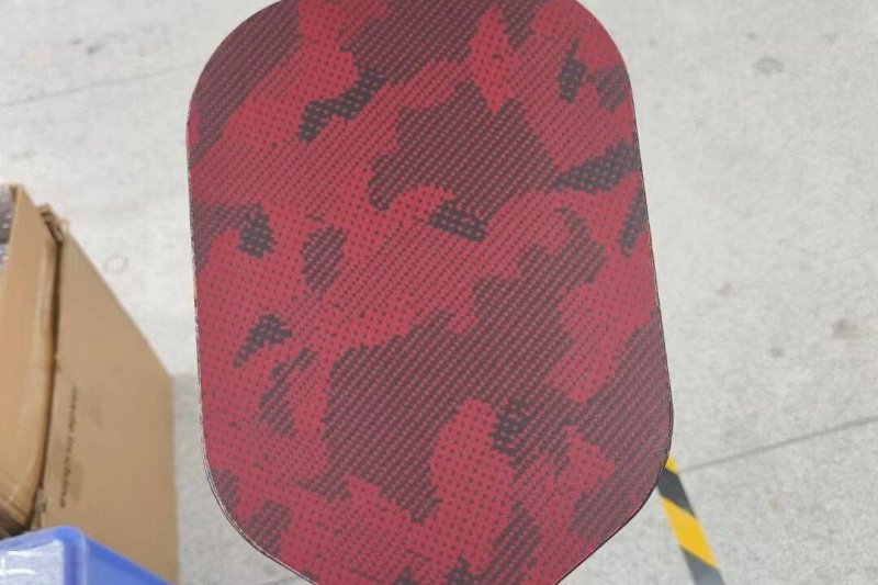 Red Camo Paddle Surface Red carbon fiber pickleball paddle with camouflage pattern