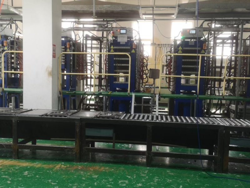 molding-process-machinery pickleball paddle molding machines in production line